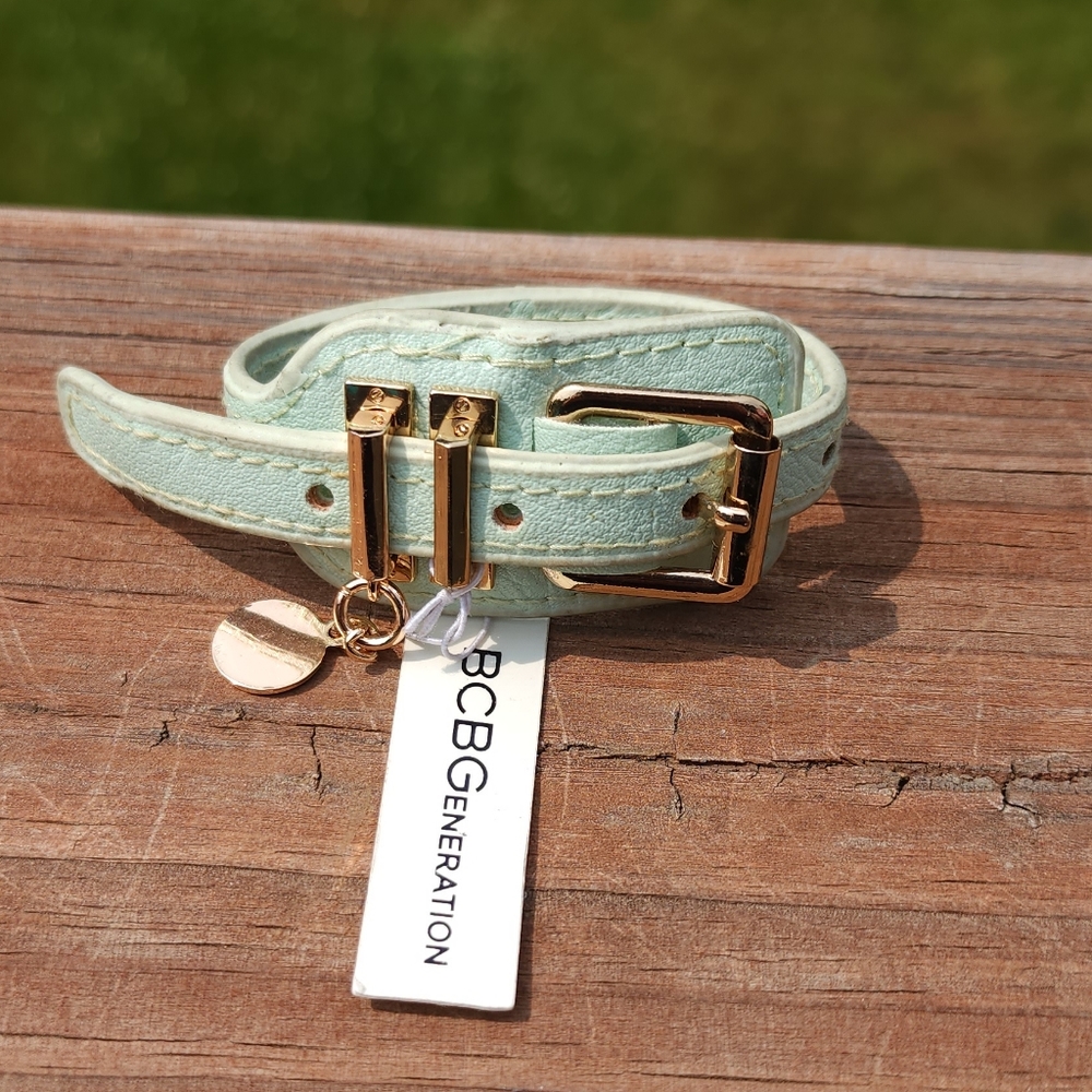 BCBG Generation adjustable bracelet rose gold with a charm